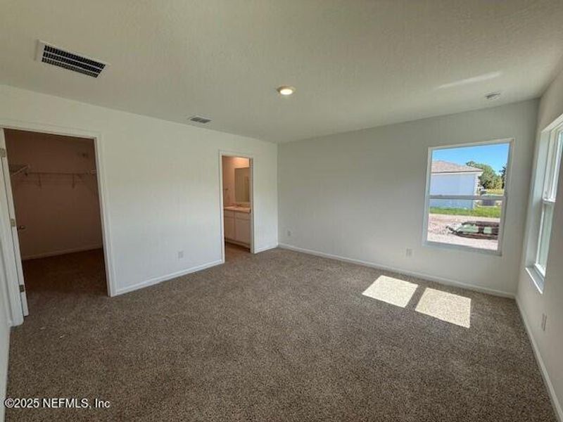 Spacious, unfurnished interior of a new home in Grand Reserve, Bunnell (Image 22).