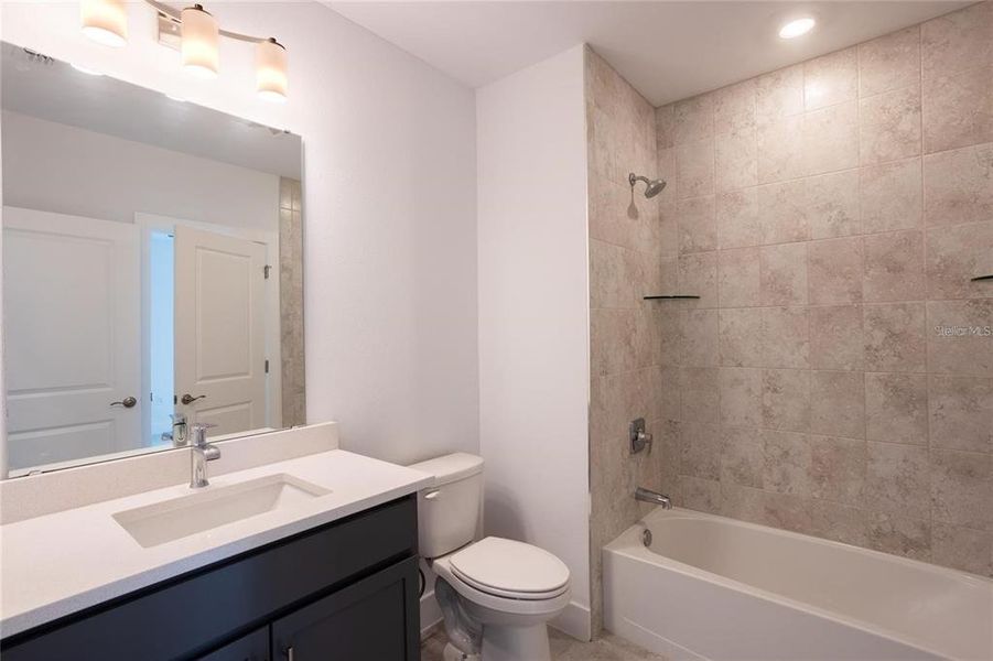 Furnished interior view inside a new home in , Port Charlotte (Image 6). Furnished interior view inside a new home in , Port Charlotte (Image 6).