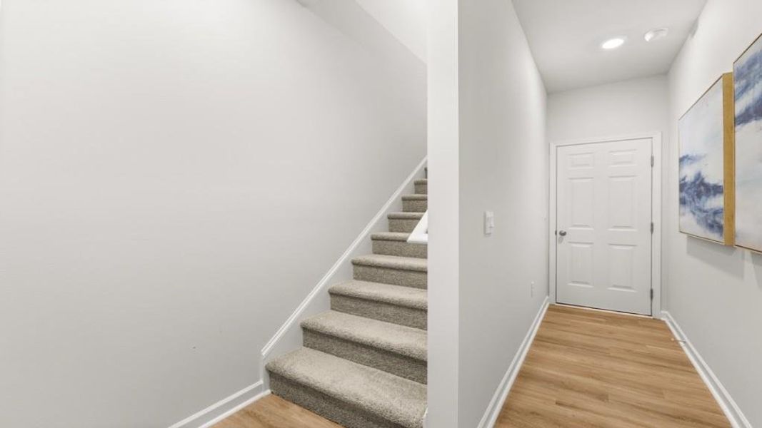 Spacious, unfurnished interior of a new home in Waypoint, Flowery Branch (Image 22).