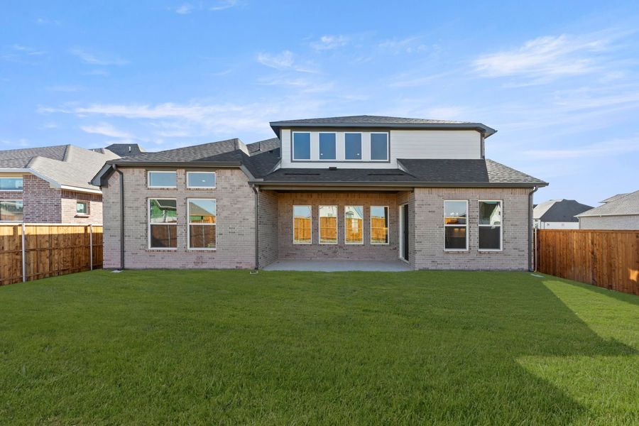 Exterior details and patio area of a home in Wildflower Ranch, Justin (Image 3).