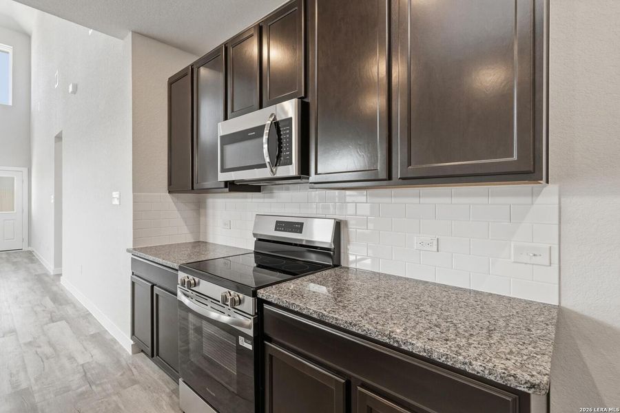 Furnished interior view inside a new home in Red Hawk Landing, San Antonio (Image 5).