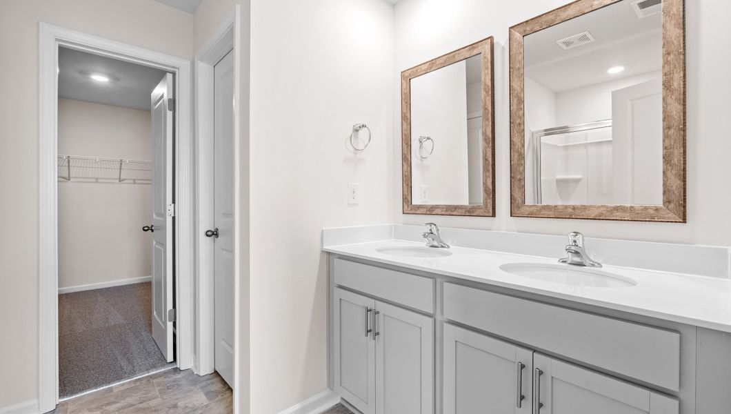 Representative furnished interior of a home built from the Biltmore by D.R. Horton in Hunters Ridge, Woodruff (Image 12).