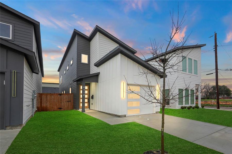 Front exterior of a new home in , Dallas, TX, highlighting curb appeal (Image 16).