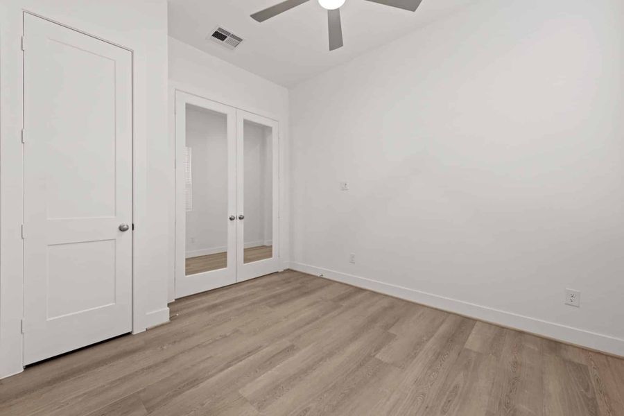 Representative unfurnished interior of a home built from the Malani – 60′ Lot by Chesmar Homes in Fulshear Lakes, Fulshear (Image 23).