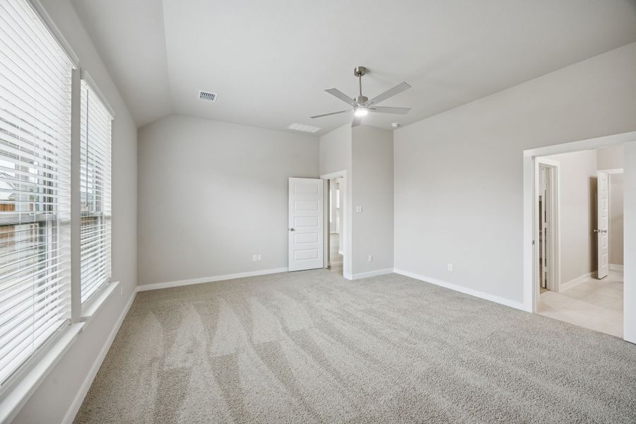 Primary Suite in the Stanley II home plan by Trophy Signature Homes – REPRESENTATIVE PHOTO