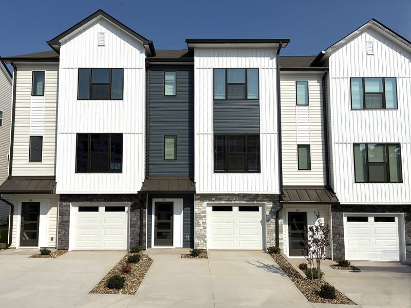 Front exterior of a new home in Holly View, Greenville, SC, highlighting curb appeal (Image 1). Front exterior of a new home in Holly View, Greenville, SC, highlighting curb appeal (Image 1).