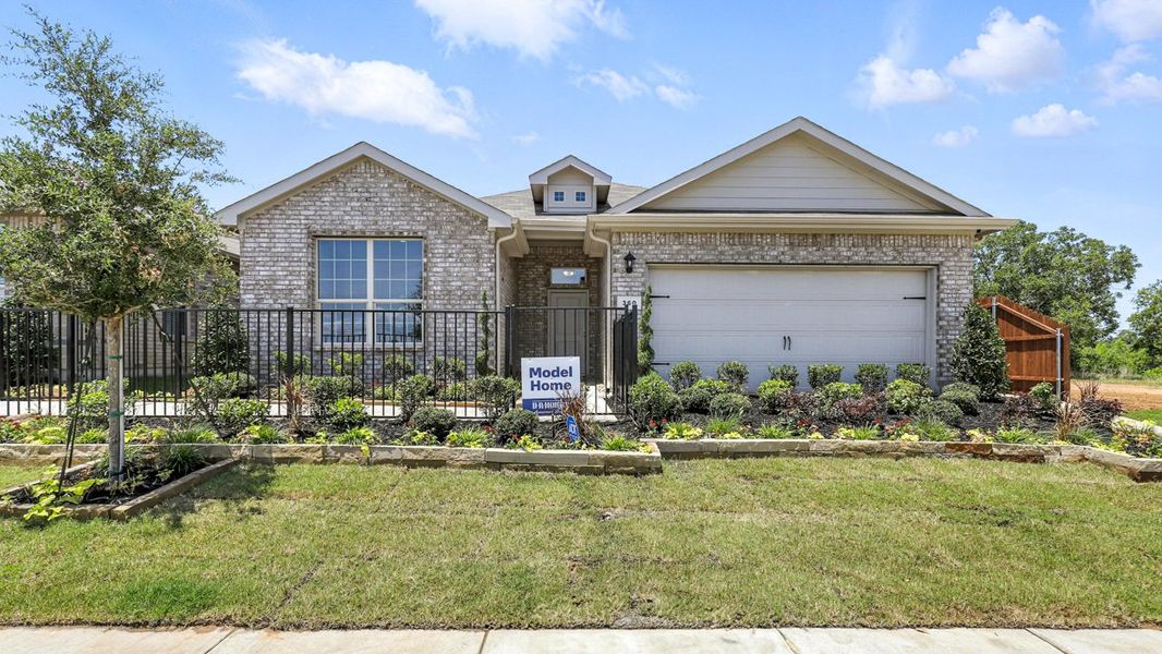 Representative exterior photo of a completed home built from the OXFORD by D.R. Horton in Vista Point, Grandview, TX (Image 1). Representative exterior photo of a completed home built from the OXFORD by D.R. Horton in Vista Point, Grandview, TX (Image 1).