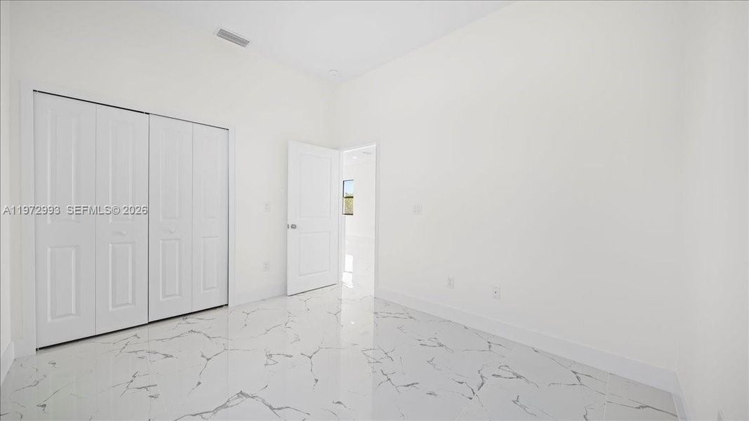 Spacious, unfurnished interior of a new home in , Lehigh Acres (Image 17).