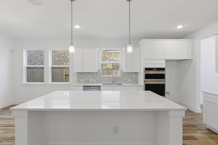 Furnished interior view inside a new home in Enclave at Cele, Pflugerville (Image 8).