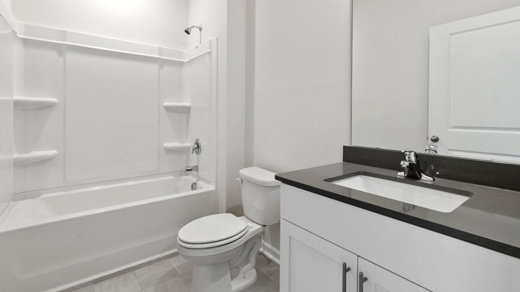 Furnished interior view inside a new home in East Ridge, Ayden (Image 10).