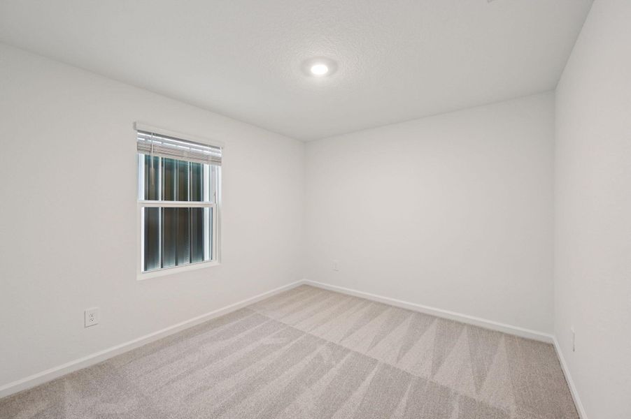 Spacious, unfurnished interior of a new home in Meritage Homes at Terra Lago - Premier Series, Indiantown (Image 19).