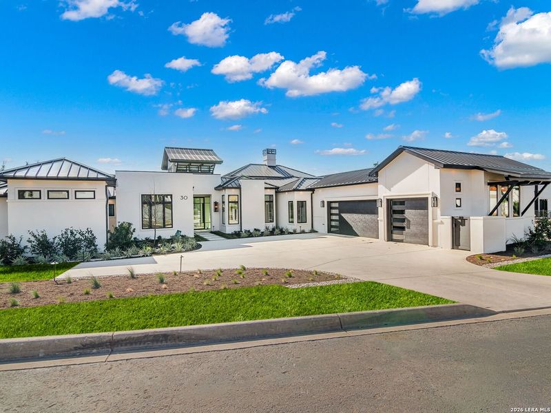 Front exterior of a new home in , San Antonio, TX, highlighting curb appeal (Image 28).