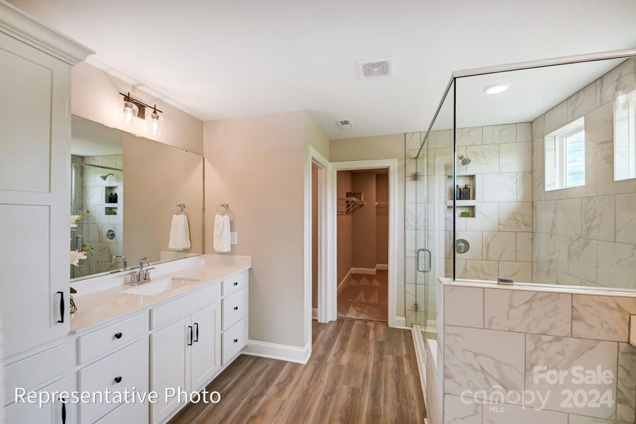 This primary bath will feature Luxury Bath with garden tub as well as tile shower