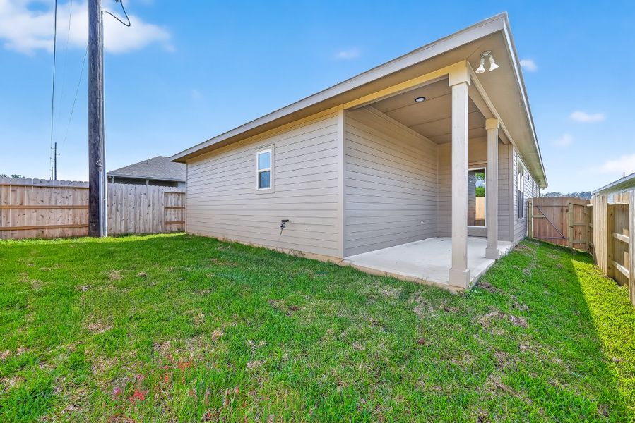 Exterior details and patio area of a home in Mostyn Springs, Magnolia (Image 4).