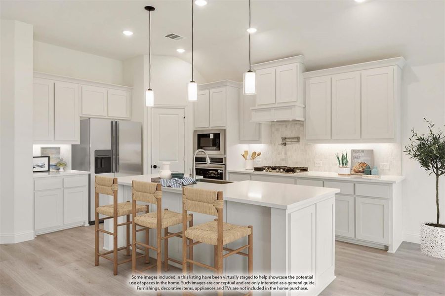 White kitchen with center island, three bar stools, pendant lights, and stainless steel appliances White kitchen with center island, three bar stools, pendant lights, and stainless steel appliances