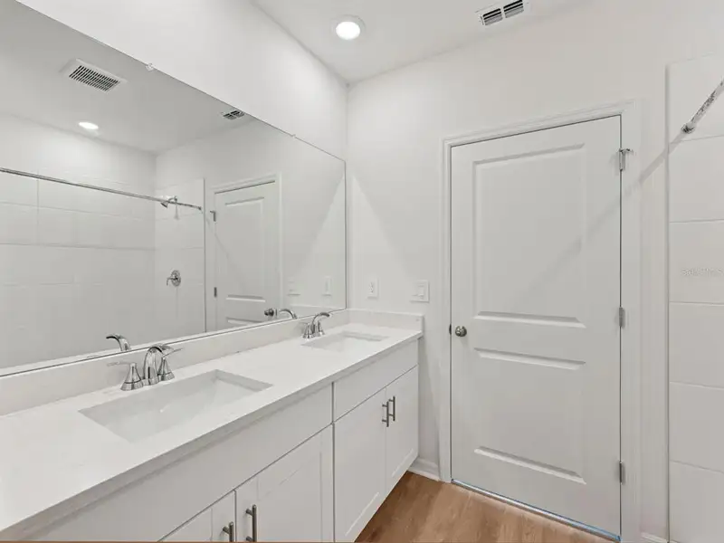 Furnished interior view inside a new home in Oakfield Trails - Premier Series, Parrish (Image 8).