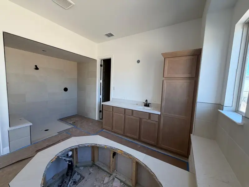 In-progress construction of a new home in Hawkes Landing, Leander, TX (Image 6).