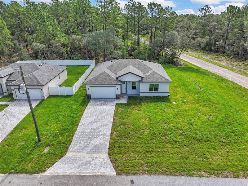 Front exterior of a new home in , Citrus Springs, FL, highlighting curb appeal (Image 2). Front exterior of a new home in , Citrus Springs, FL, highlighting curb appeal (Image 2).