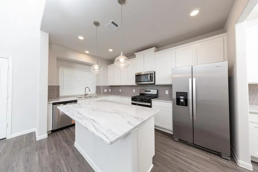 Photos are a representation of the floor plan. Options and interior selections will vary.