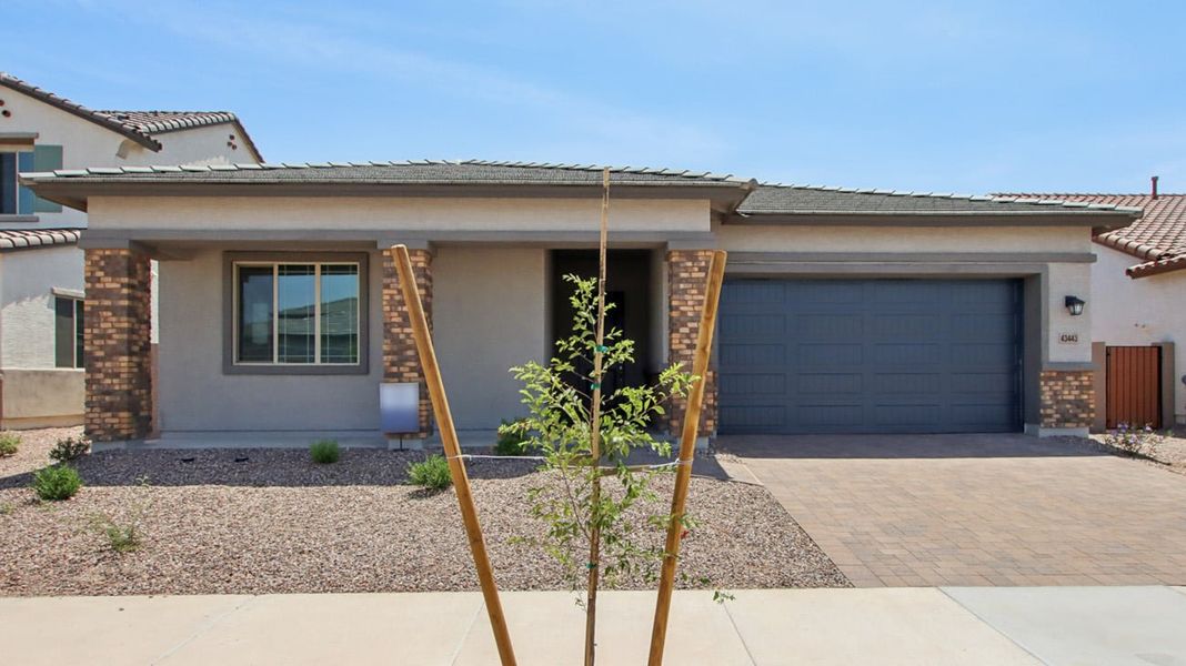 Representative exterior photo of a completed home built from the 4503 by Risewell Homes in North Creek, Queen Creek, AZ (Image 7).