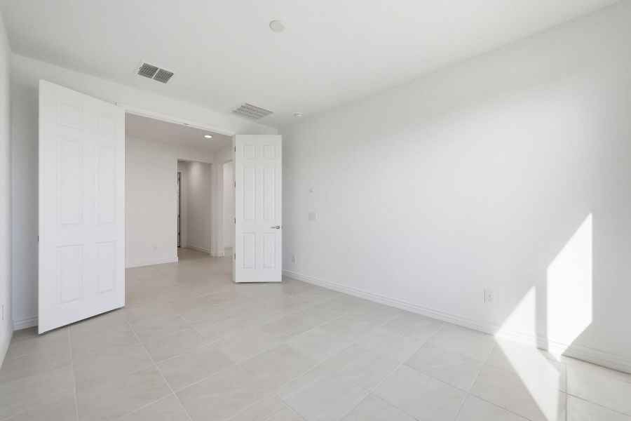 Spacious, unfurnished interior of a new home in Miravida, Surprise (Image 13).