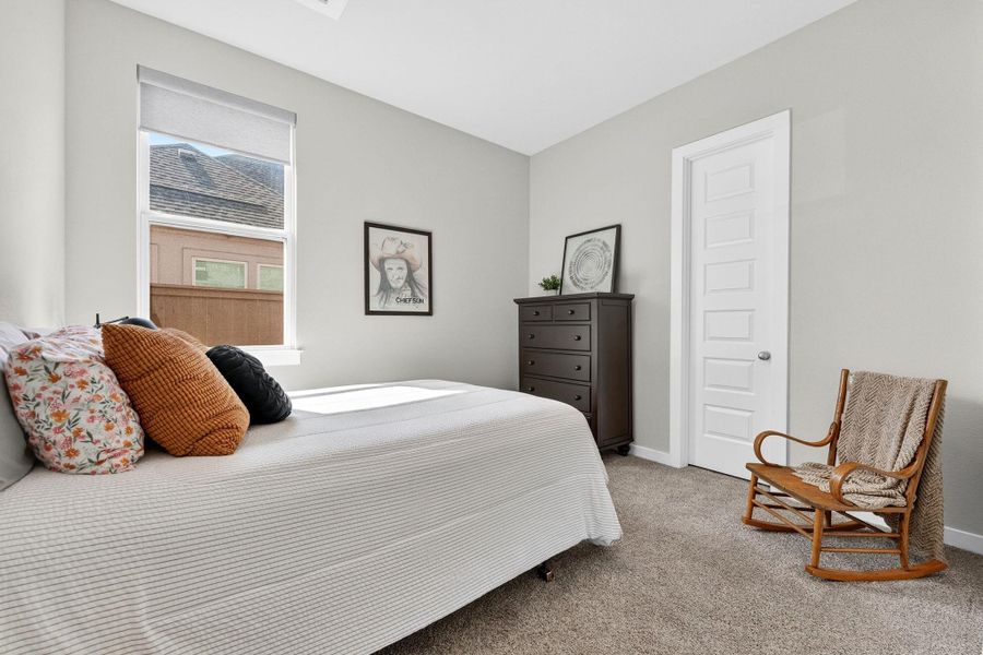 Secondary bedroom suite on the main floor.