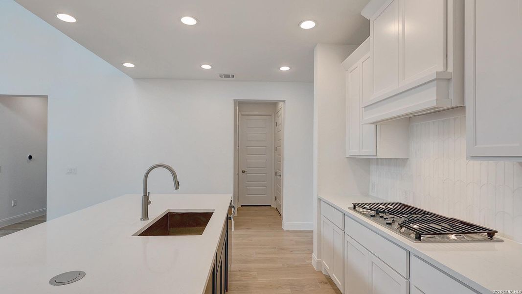 Furnished interior view inside a new home in VIDA, San Antonio (Image 7).