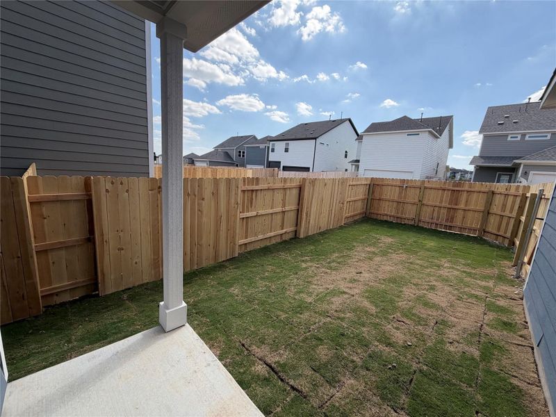 Exterior details and patio area of a home in Lariat, Liberty Hill (Image 3).