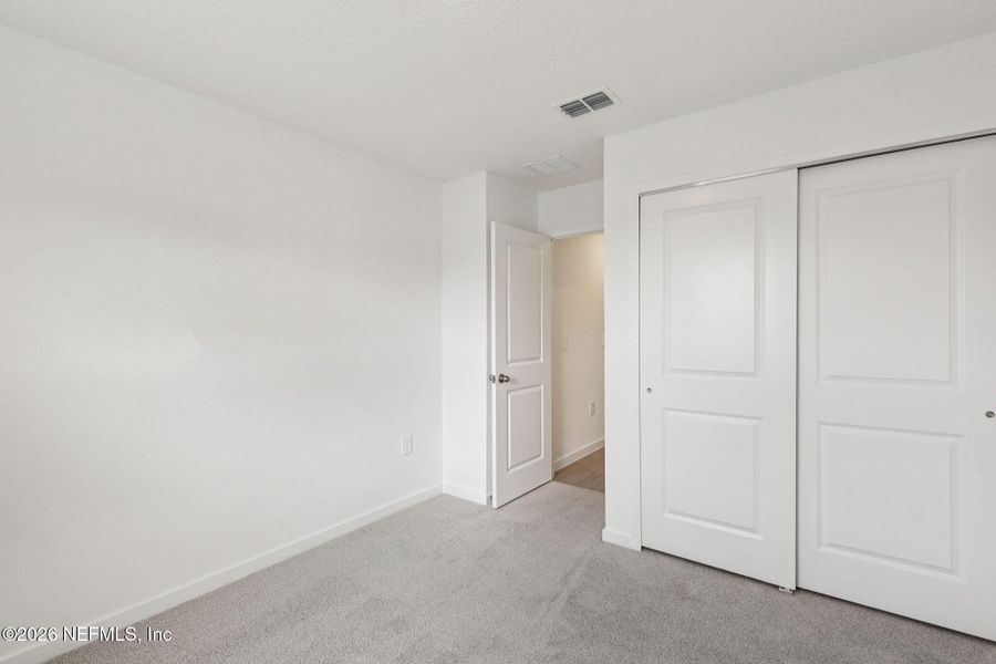 Spacious, unfurnished interior of a new home in Cypress Meadows - Signature Series, Jacksonville (Image 25).