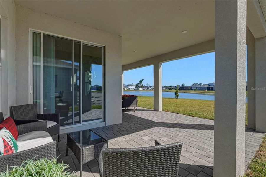 Exterior details and patio area of a home in West Port Single Family Homes, Port Charlotte (Image 26).