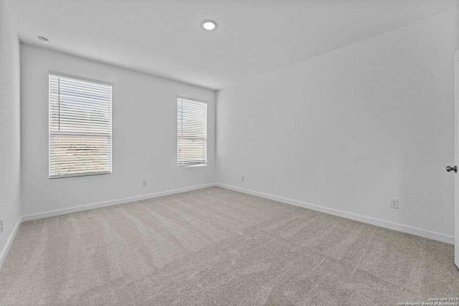 Spacious, unfurnished interior of a new home in Waterwheel: Coastline Collection, San Antonio (Image 15).
