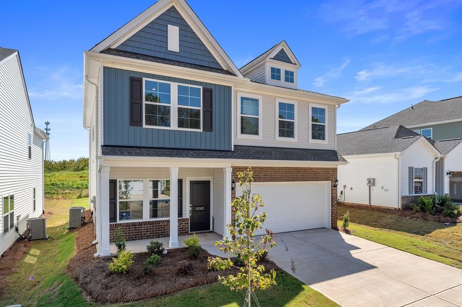 Front exterior of a new home in Richmond Hill, Inman, SC, highlighting curb appeal (Image 18). Front exterior of a new home in Richmond Hill, Inman, SC, highlighting curb appeal (Image 18).