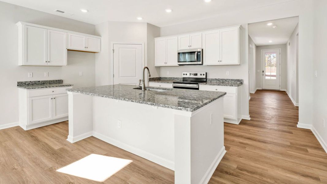 Furnished interior view inside a new home in Grayson Park, Leland (Image 7).
