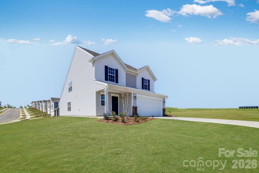 Front exterior of a new home in Cleveland Hill, Shelby, NC, highlighting curb appeal (Image 16). Front exterior of a new home in Cleveland Hill, Shelby, NC, highlighting curb appeal (Image 16).