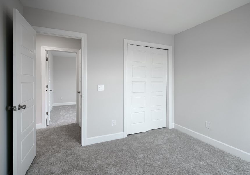 Representative unfurnished interior of a home built from the The McKee Manor by Cothran Homes in Holly Ridge, Greenville (Image 38). Representative unfurnished interior of a home built from the The McKee Manor by Cothran Homes in Holly Ridge, Greenville (Image 38).