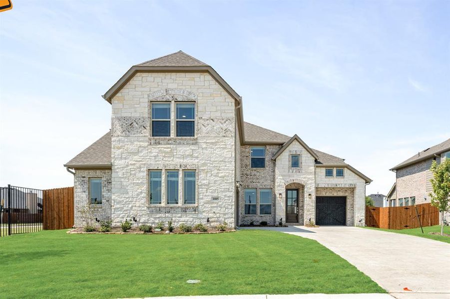 Front exterior of a new home in Mockingbird Heights Classic 60, Midlothian, TX, highlighting curb appeal (Image 1).