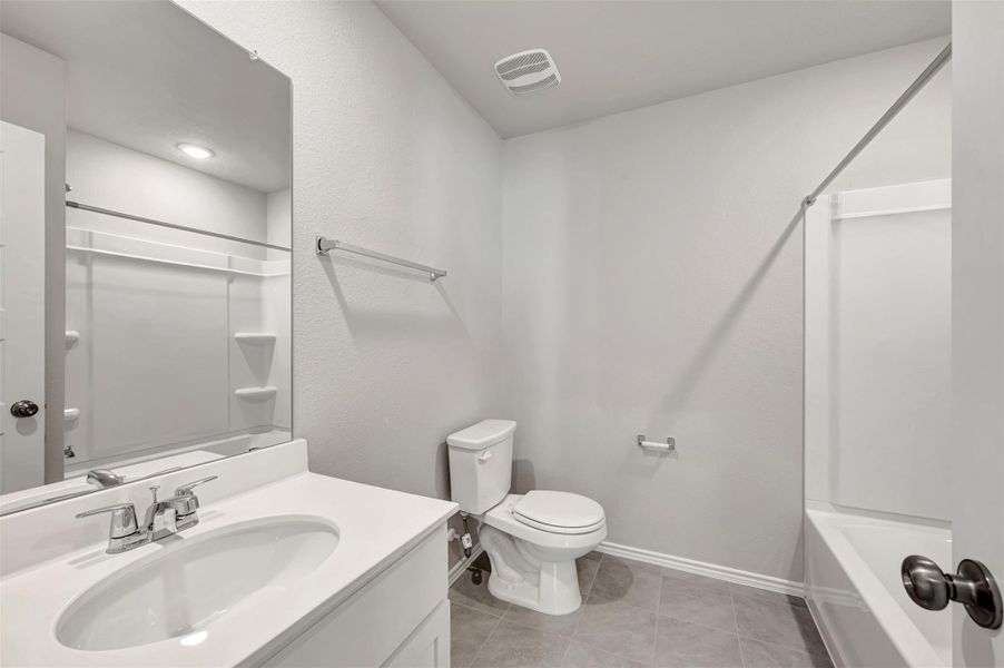 Furnished interior view inside a new home in Carillon, Manor (Image 11).