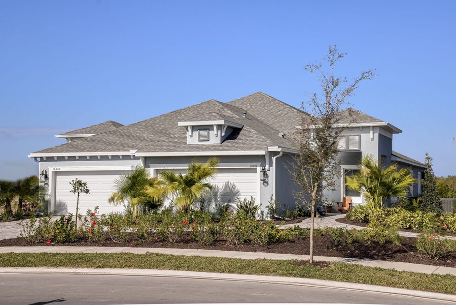 Representative exterior photo of a completed home built from the Tidewater 2B by Neal Communities in Wildleaf, Parrish, FL (Image 21). Representative exterior photo of a completed home built from the Tidewater 2B by Neal Communities in Wildleaf, Parrish, FL (Image 21).