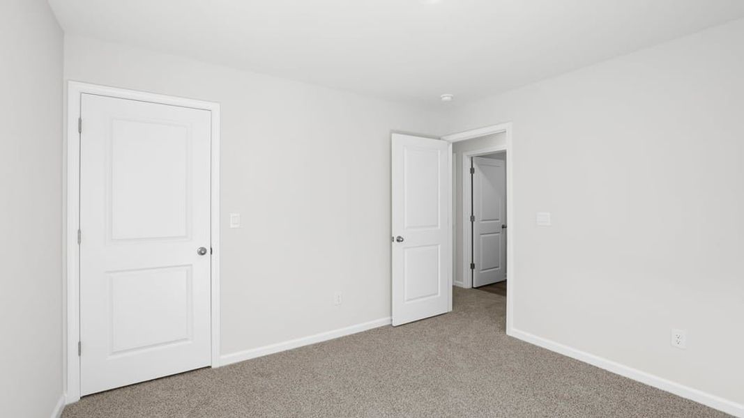 Spacious, unfurnished interior of a new home in Varner Station, Woodruff (Image 24).