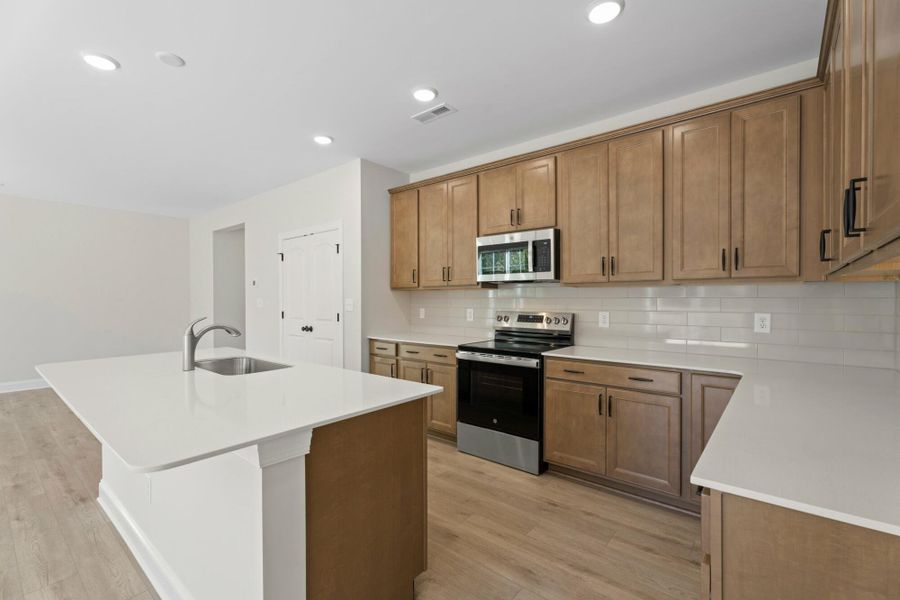 Furnished interior view inside a new home in Cottages at Piper Village, Trinity (Image 6).