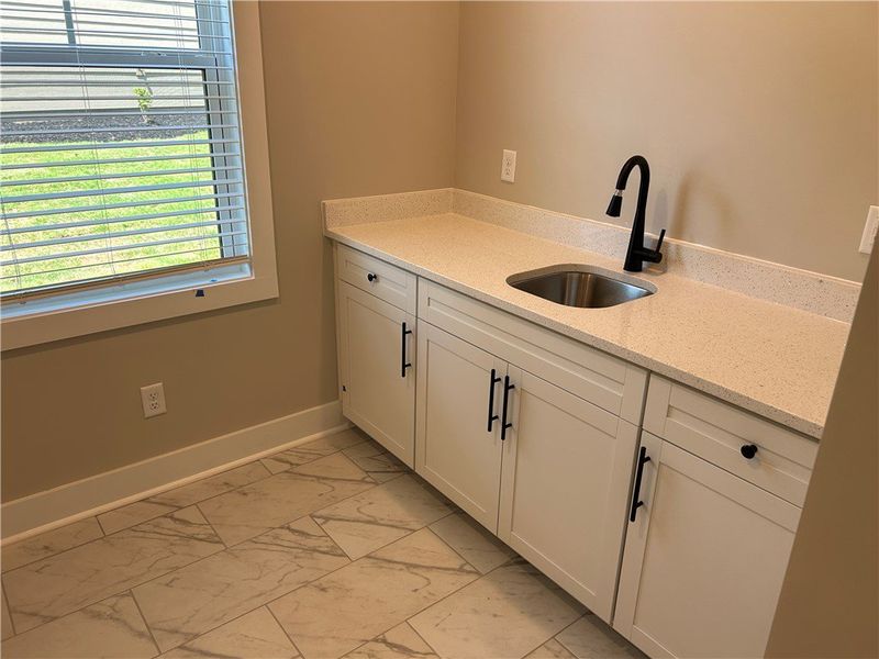 Furnished interior view inside a new home in Edwards Ridge, Central (Image 11).