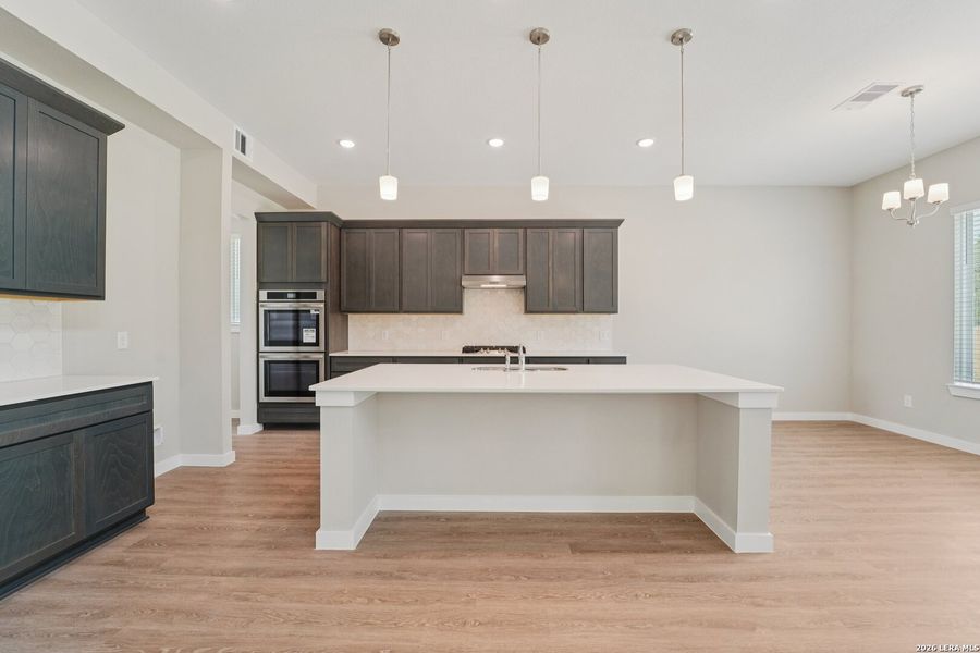 Furnished interior view inside a new home in Alamo Estates, San Antonio (Image 8).