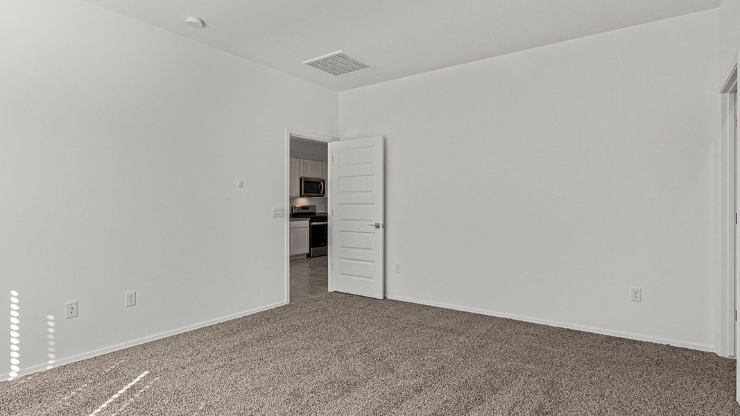 Spacious, unfurnished interior of a new home in Barnett Village, Marana (Image 25).