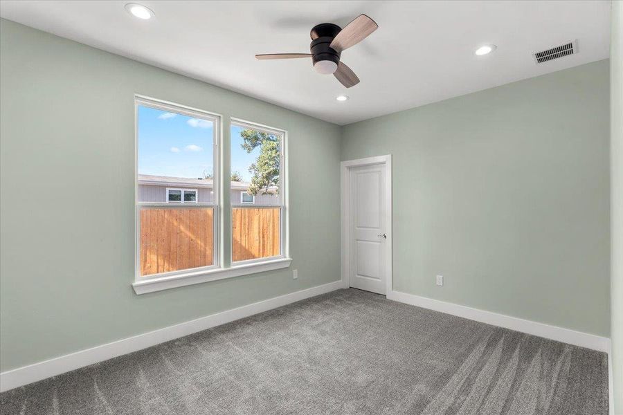 Bedroom number 2 featuring recessed lighting and ceiling fan