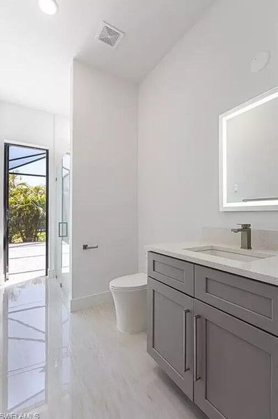 Furnished interior view inside a new home in , Cape Coral (Image 2). Furnished interior view inside a new home in , Cape Coral (Image 2).