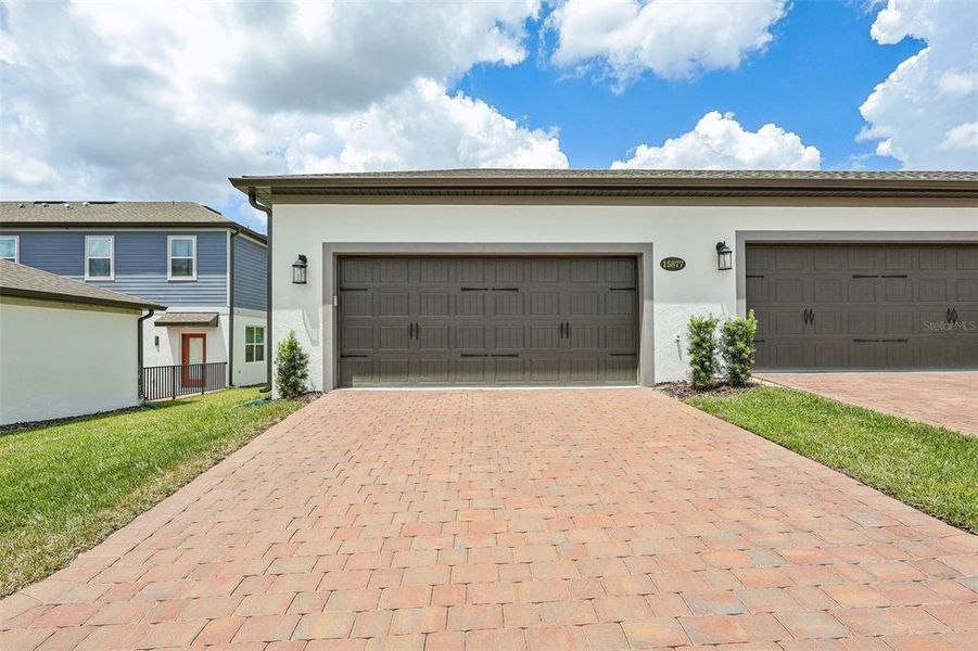 Front exterior of a new home in , Winter Garden, FL, highlighting curb appeal (Image 28).