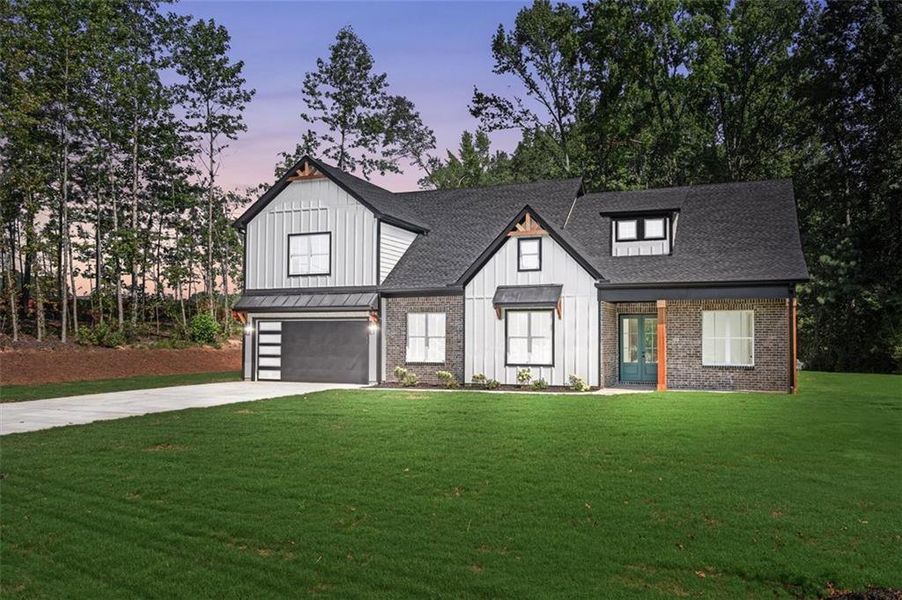 Front exterior of a new home in , Powder Springs, GA, highlighting curb appeal (Image 2). Front exterior of a new home in , Powder Springs, GA, highlighting curb appeal (Image 2).
