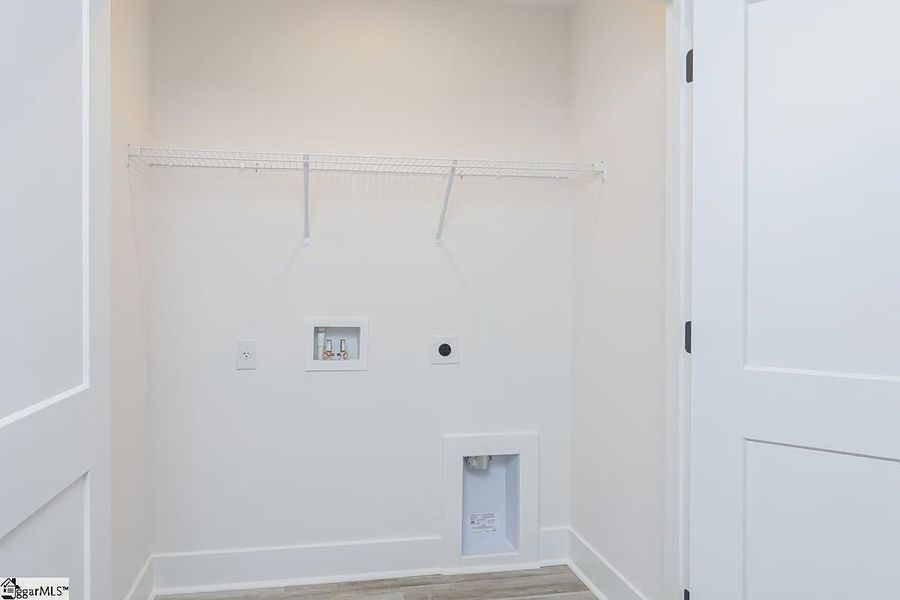 Representative unfurnished interior of a home built from the 1568 Townhome by Adams Homes in Parkstone Place Townhomes, Roebuck (Image 17). Representative unfurnished interior of a home built from the 1568 Townhome by Adams Homes in Parkstone Place Townhomes, Roebuck (Image 17).