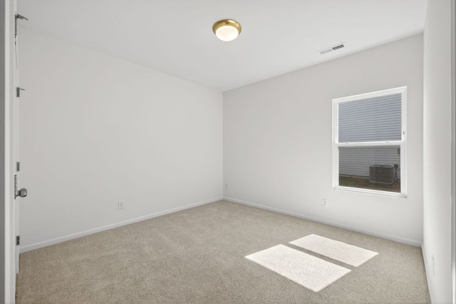 Spacious, unfurnished interior of a new home in Nathans Ridge, Lillington (Image 22).
