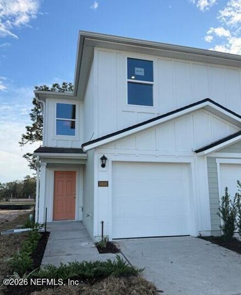 Front exterior of a new home in Trout River, Jacksonville, FL, highlighting curb appeal (Image 2).